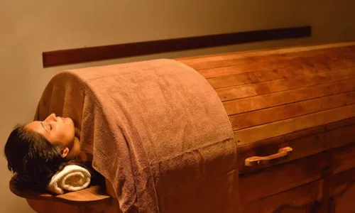 An Ayurvedic steam therapy inducing therapeutic sweating to expel toxins, reduce stiffness, balance doshas, enhance circulation, and support healing in arthritis, muscle pain, colds, skin disorders, and detox needs